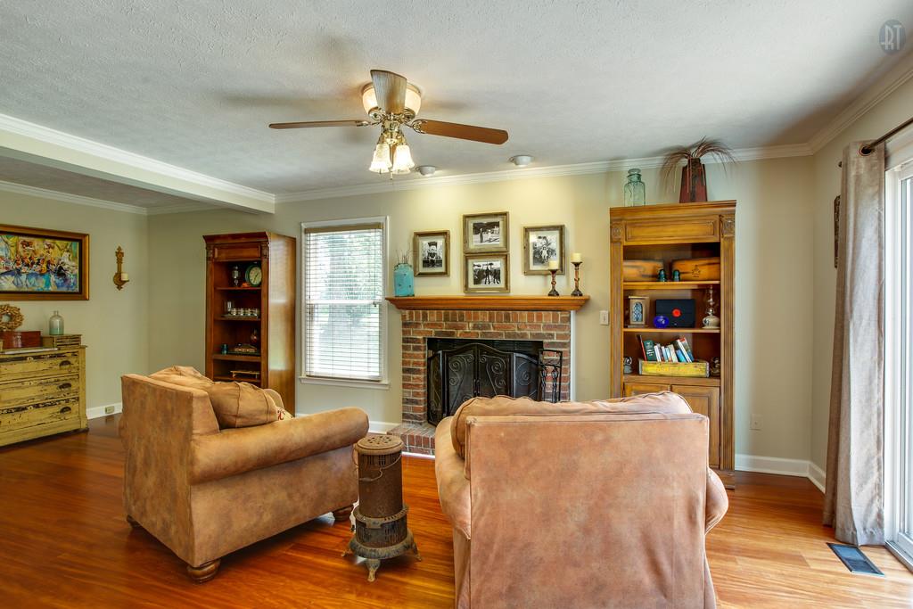 5909 Parham Road Franklin, TN 37064 - Photo 10 of 23 a living room with furniture and a fireplace