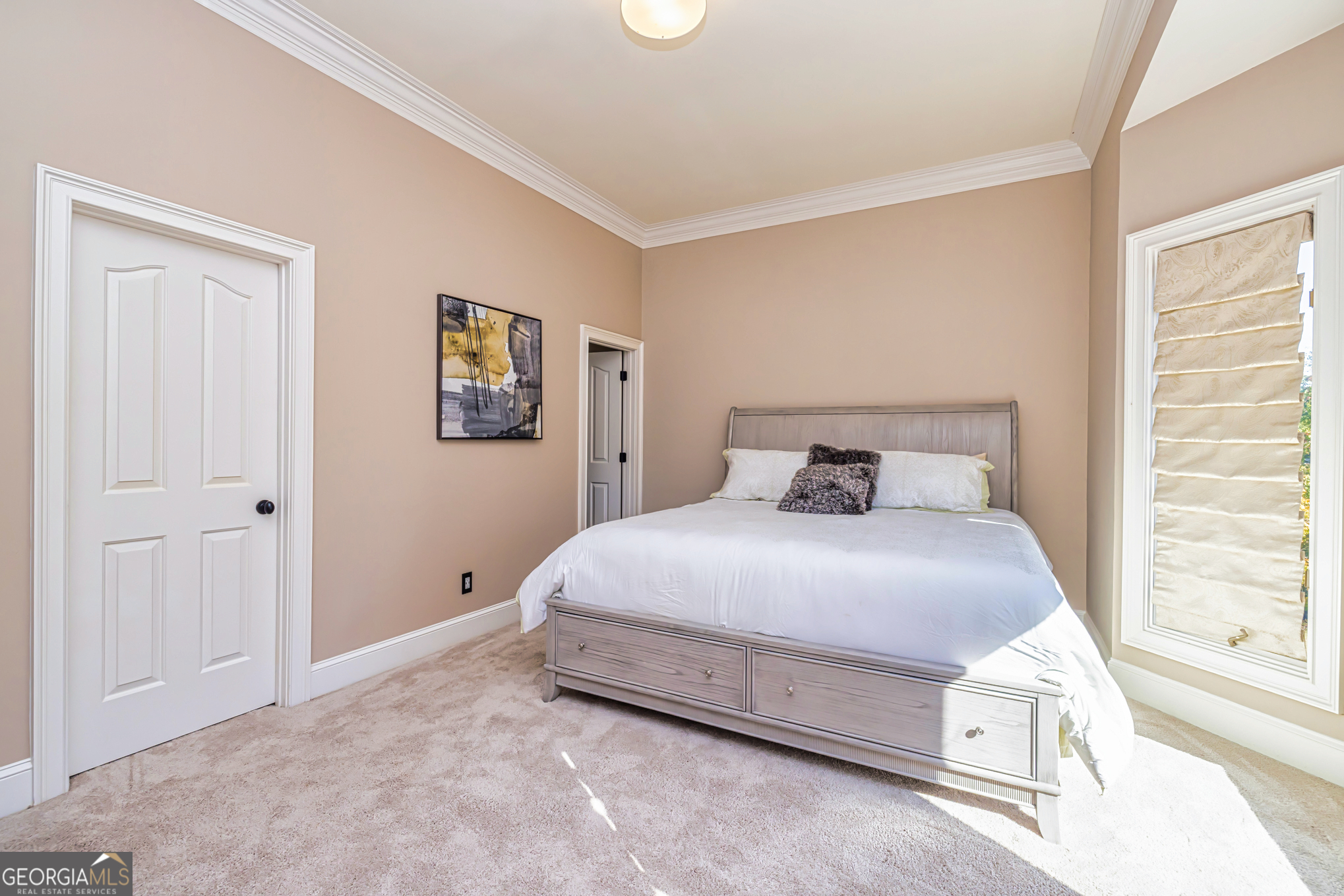 131 Lincoln Road Tyrone, GA 30290 - Photo 16 of 82 a bedroom with a bed and window