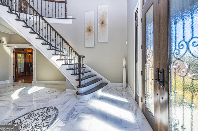a view of entryway livingroom and hall