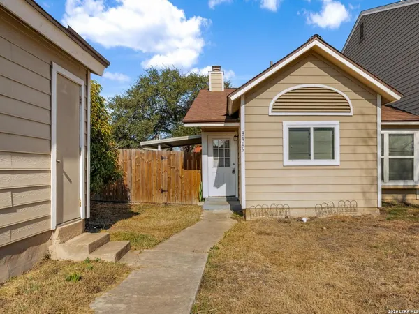 a view of backyard of house