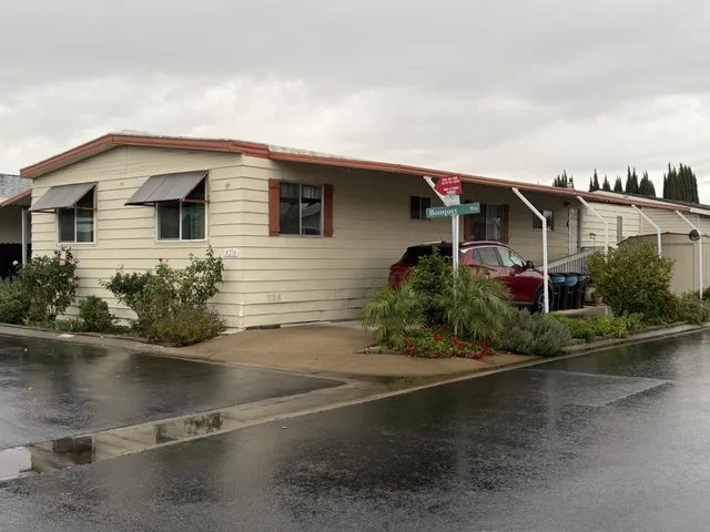 a view of a balcony with chairs