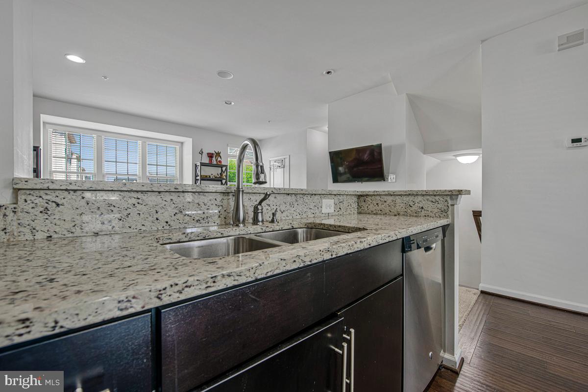 14413 Sandy Ridge Lane Laurel, MD 20707 - Photo 10 of 41 Modern kitchen with sleek finishes.
