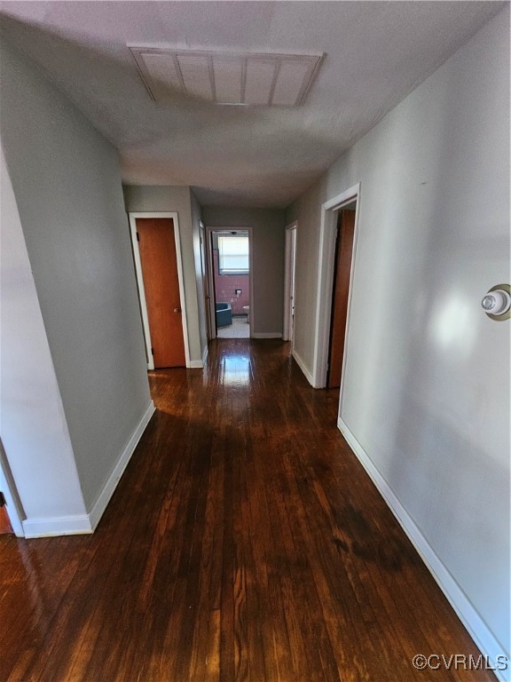 4010 Dill Road Richmond, VA 23222 - Photo 7 of 12 a view of a hallway with wooden floor