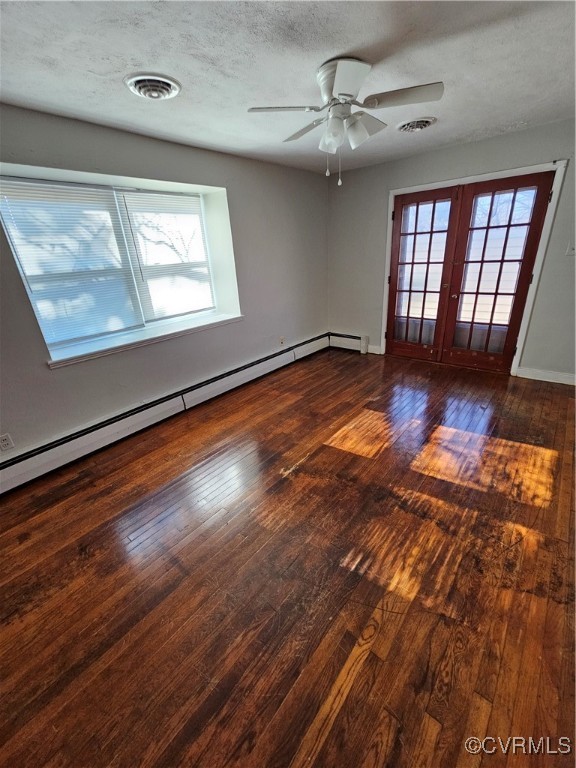 4010 Dill Road Richmond, VA 23222 - Photo 10 of 12 a view of an empty room with wooden floor and a window