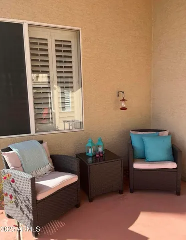 a living room with furniture and a window