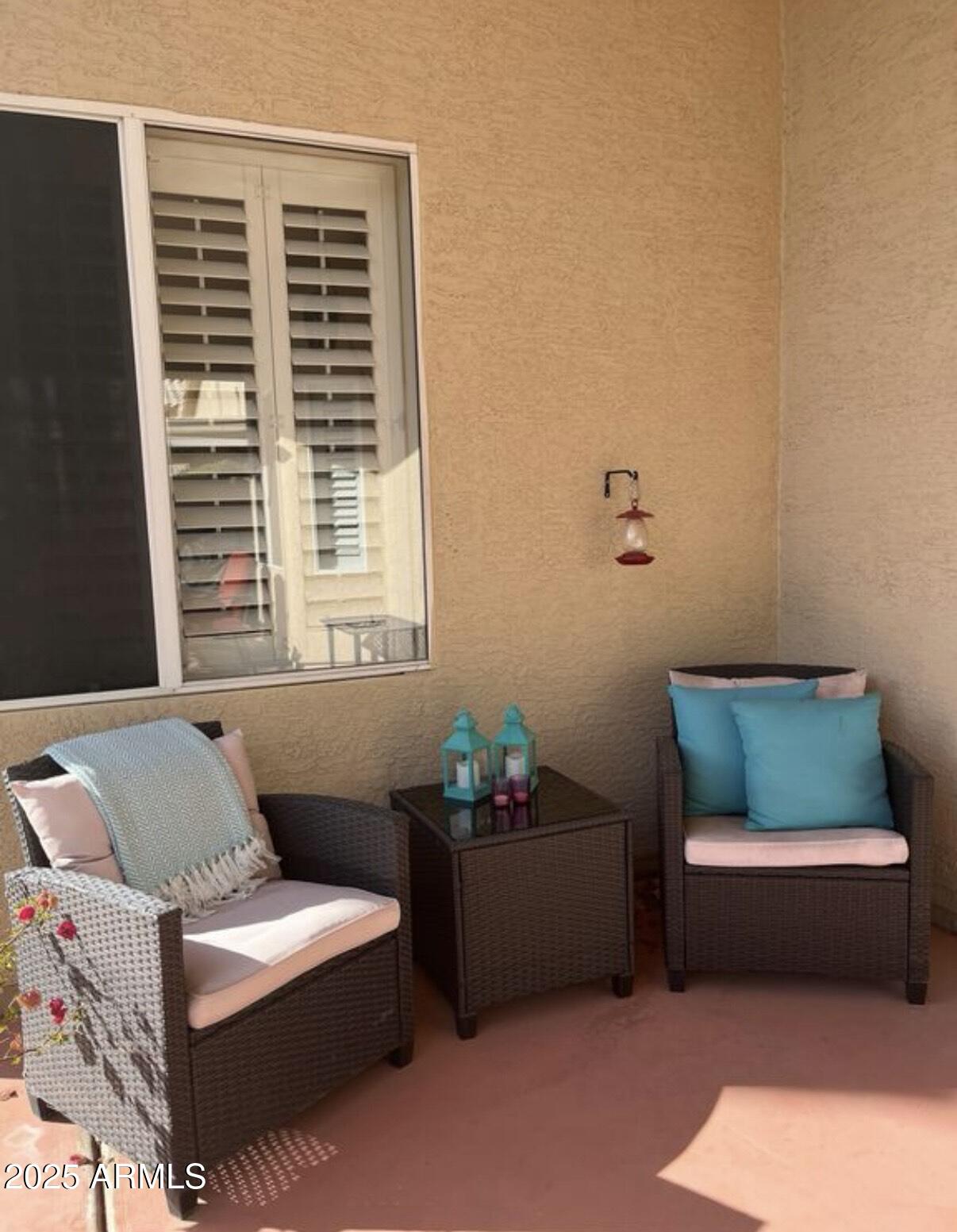 9233 East Blanche Drive Scottsdale, AZ 85260 - Photo 11 of 13 a living room with furniture and a window
