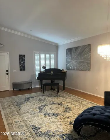 a living room with furniture and a rug