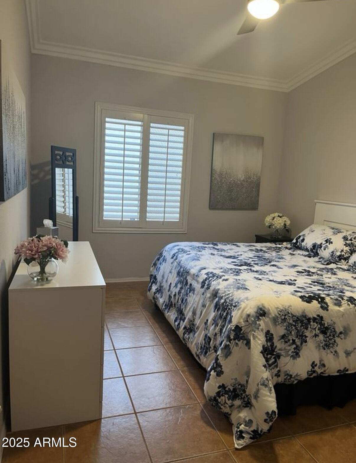 9233 East Blanche Drive Scottsdale, AZ 85260 - Photo 6 of 13 a bedroom with a bed and a window