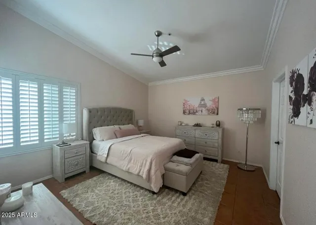 a bedroom with a bed and window