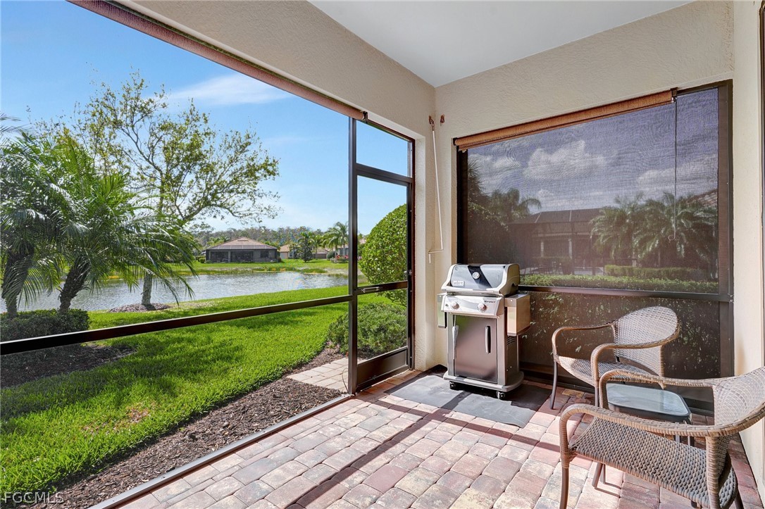 10879 Rutherford Road Fort Myers, FL 33913 - Photo 20 of 36 a room with patio entrance and garden view