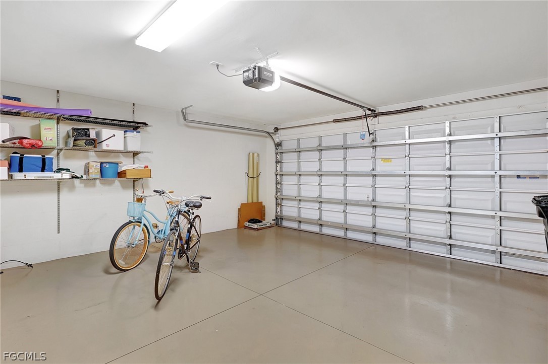10879 Rutherford Road Fort Myers, FL 33913 - Photo 22 of 36 a view of a garage with storage