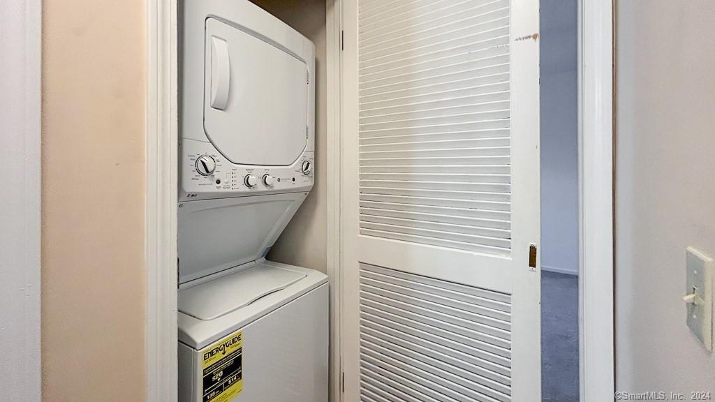 8 Derby Court, Unit 8 Brookfield, CT 06804 - Photo 20 of 26 a utility room with dryer and washer