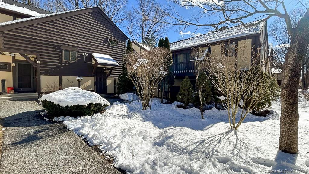 8 Derby Court, Unit 8 Brookfield, CT 06804 - Photo 24 of 26 a backyard of a house with barbeque oven and outdoor seating
