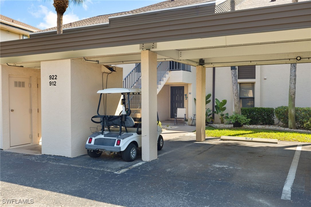 5925 Trailwinds Drive, Unit 912 Fort Myers, FL 33907 - Photo 2 of 39 a view of a building with tub and view of the house
