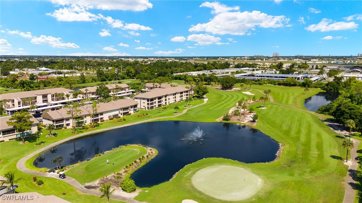 5925 Trailwinds Drive, Unit 912 Fort Myers, FL 33907 - Photo 30 of 39 an aerial view of residential houses with outdoor space and swimming pool