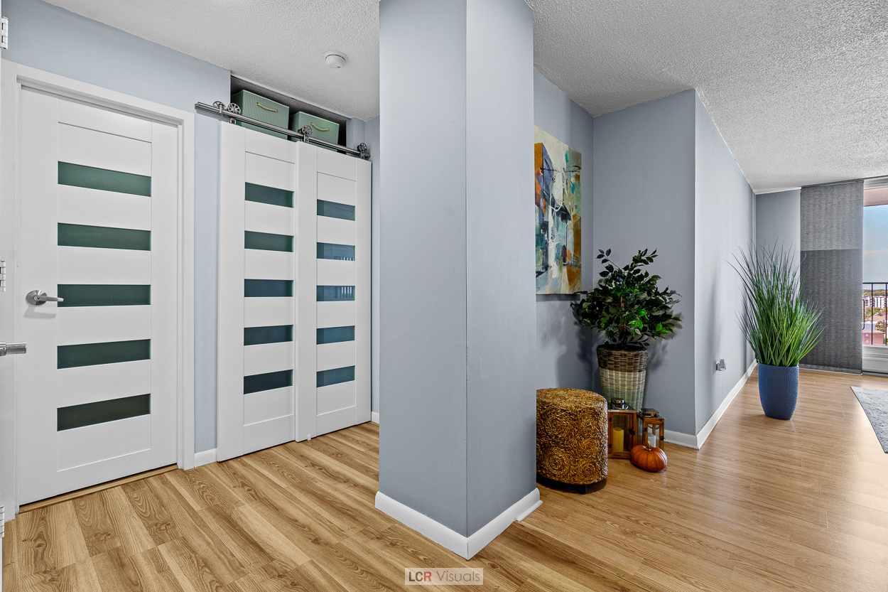 8815 West Golf Road, Unit 10C Niles, IL 60714 - Photo 3 of 27 a view of a living room and wooden floor