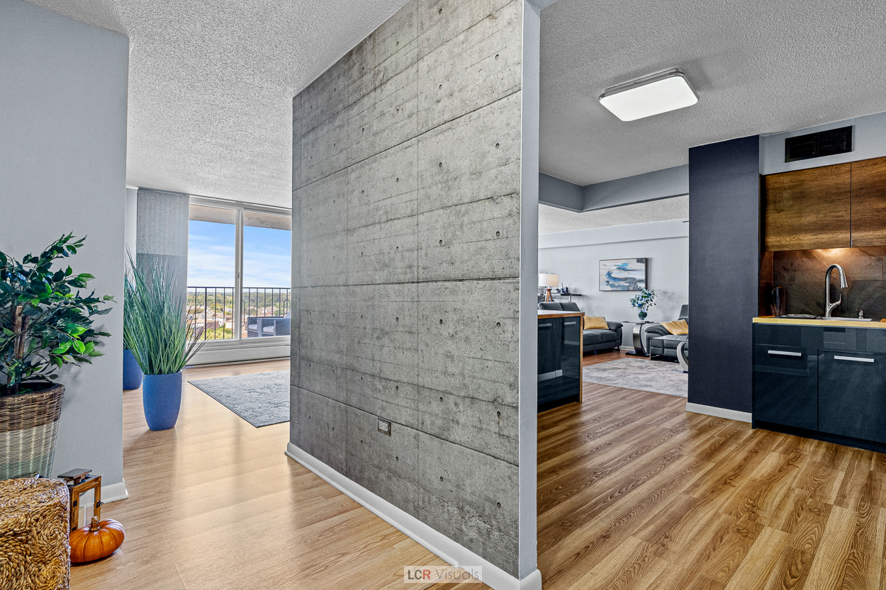 8815 West Golf Road, Unit 10C Niles, IL 60714 - Photo 4 of 27 a view of living room kitchen and entryway