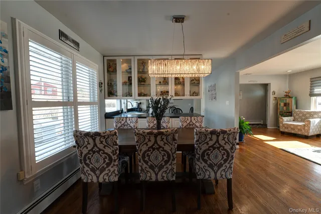 a view of a dining room with furniture window and outside view