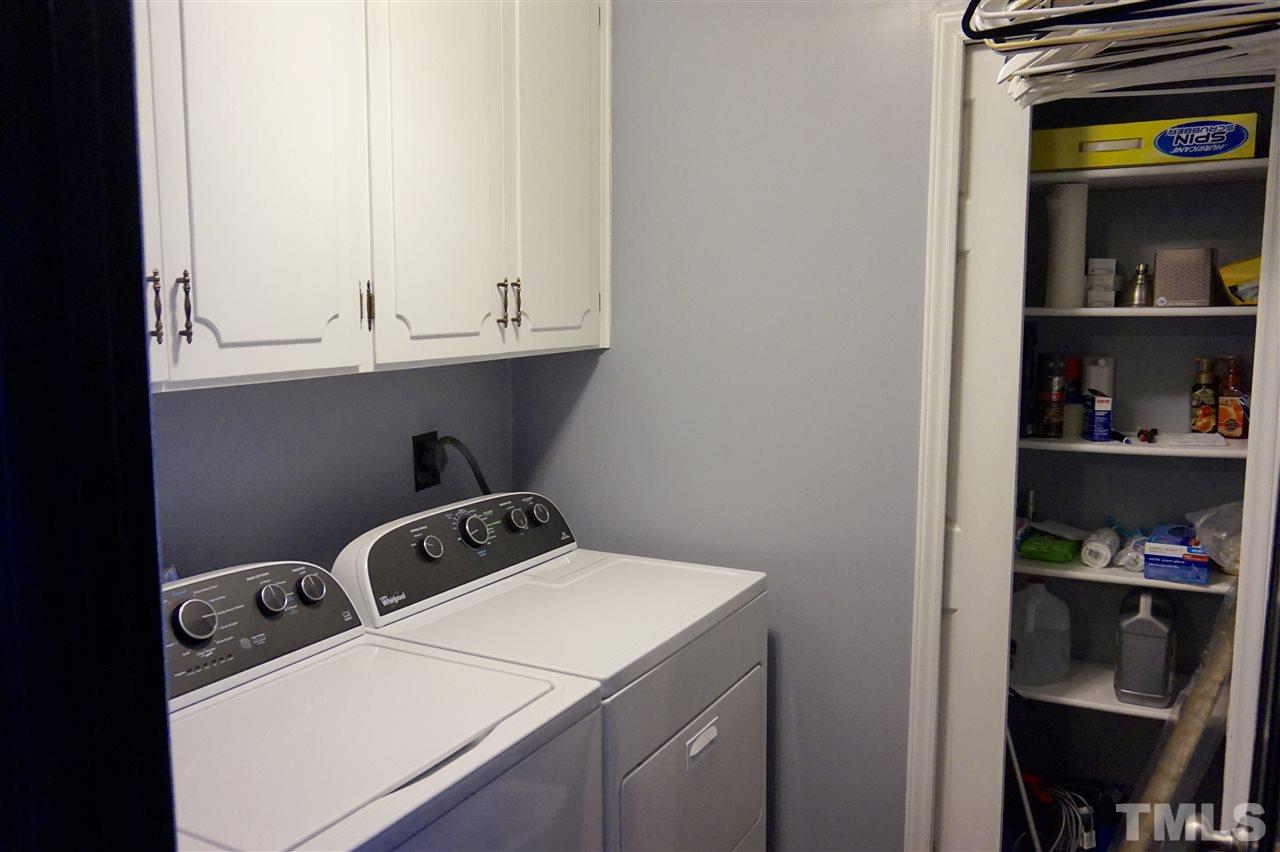 8605 Maidstone Court Raleigh, NC 27613 - Photo 12 of 13 a room with storage and utility