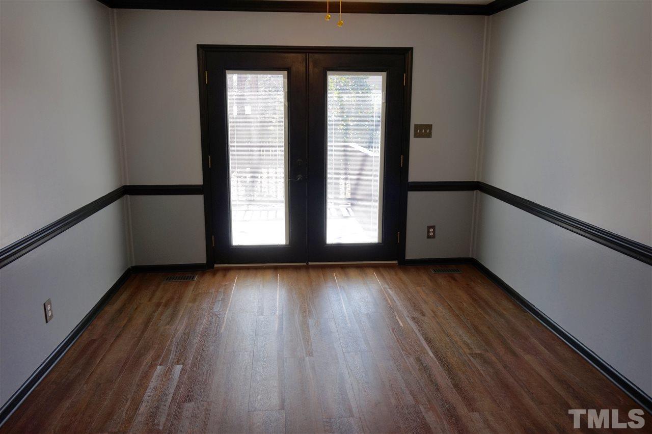 8605 Maidstone Court Raleigh, NC 27613 - Photo 6 of 13 a view of wooden floor and windows in a room