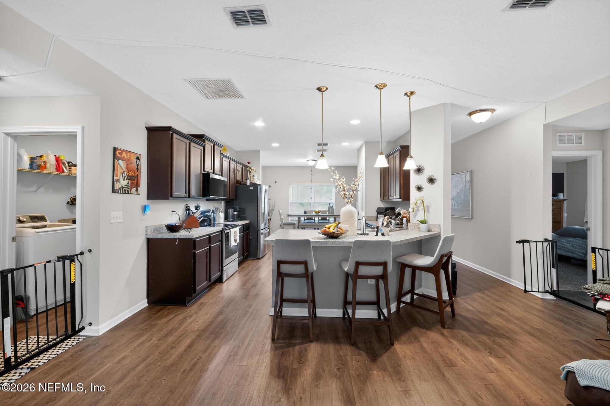 2696 Anniston Road Jacksonville, FL 32246 - Photo 7 of 26 2696_Anniston_Rd-Kitchen-4882