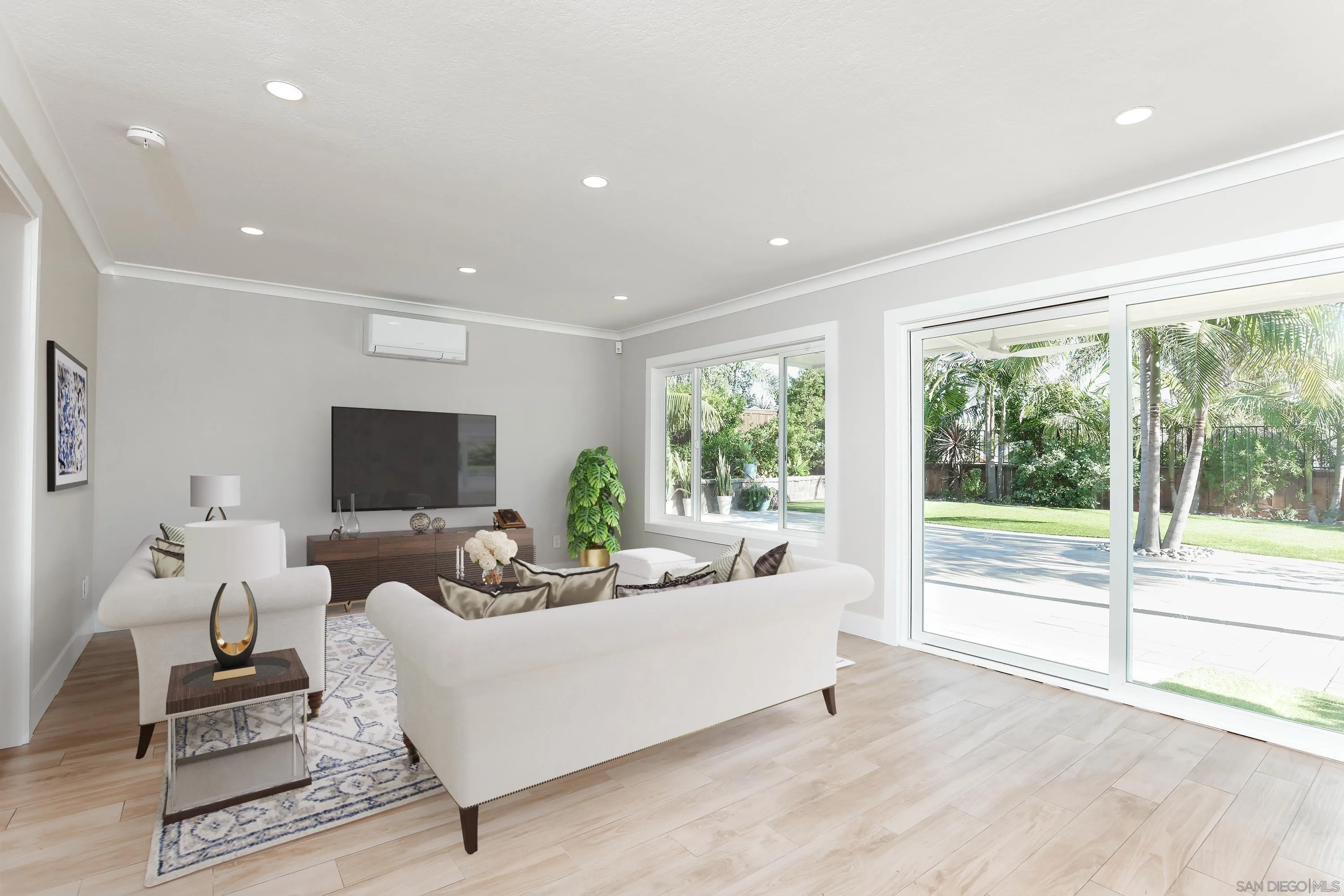 2102 Wandering Road Encinitas, CA 92024 - Photo 11 of 37 a living room with furniture and a flat screen tv