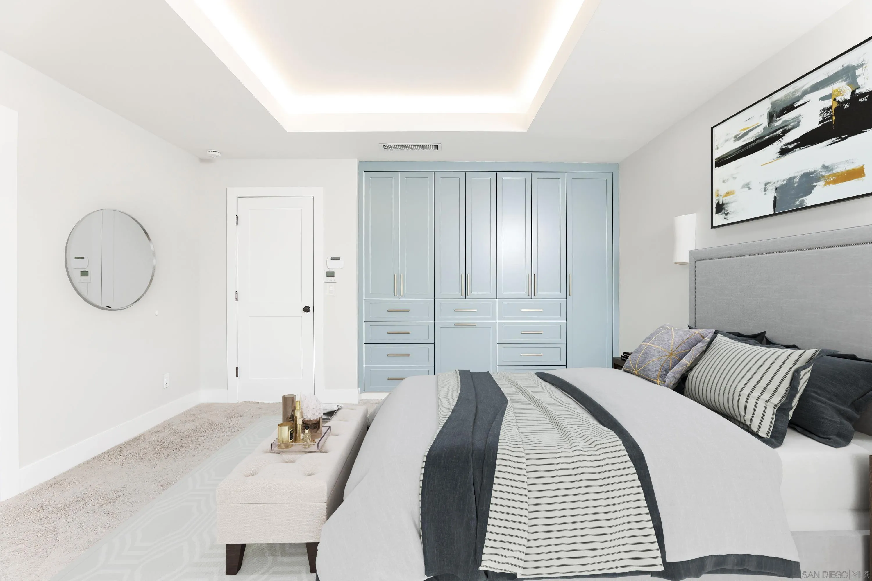 2102 Wandering Road Encinitas, CA 92024 - Photo 15 of 37 a bedroom with a bed and a chandelier