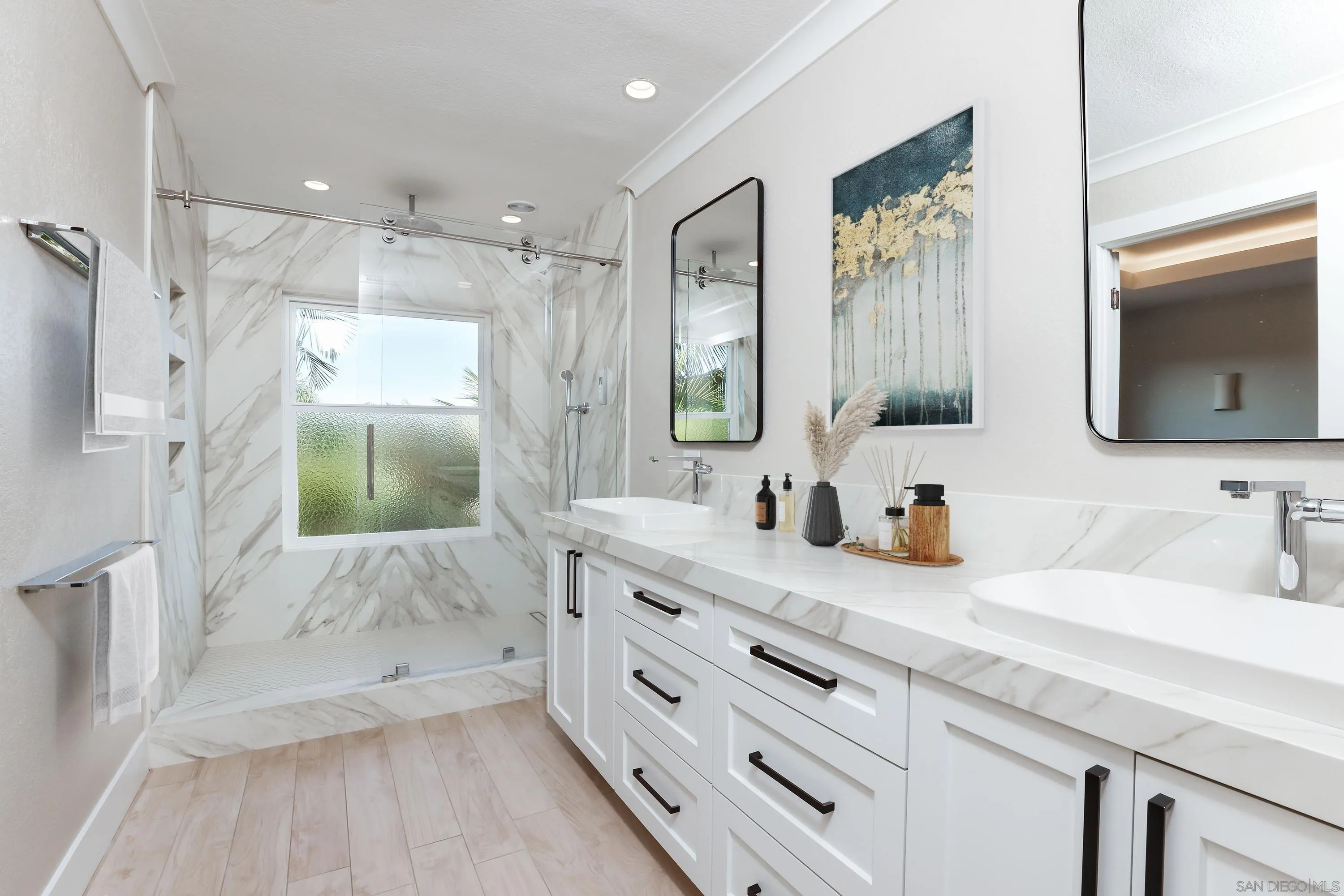 2102 Wandering Road Encinitas, CA 92024 - Photo 17 of 37 a bathroom with a granite countertop sink mirror and double