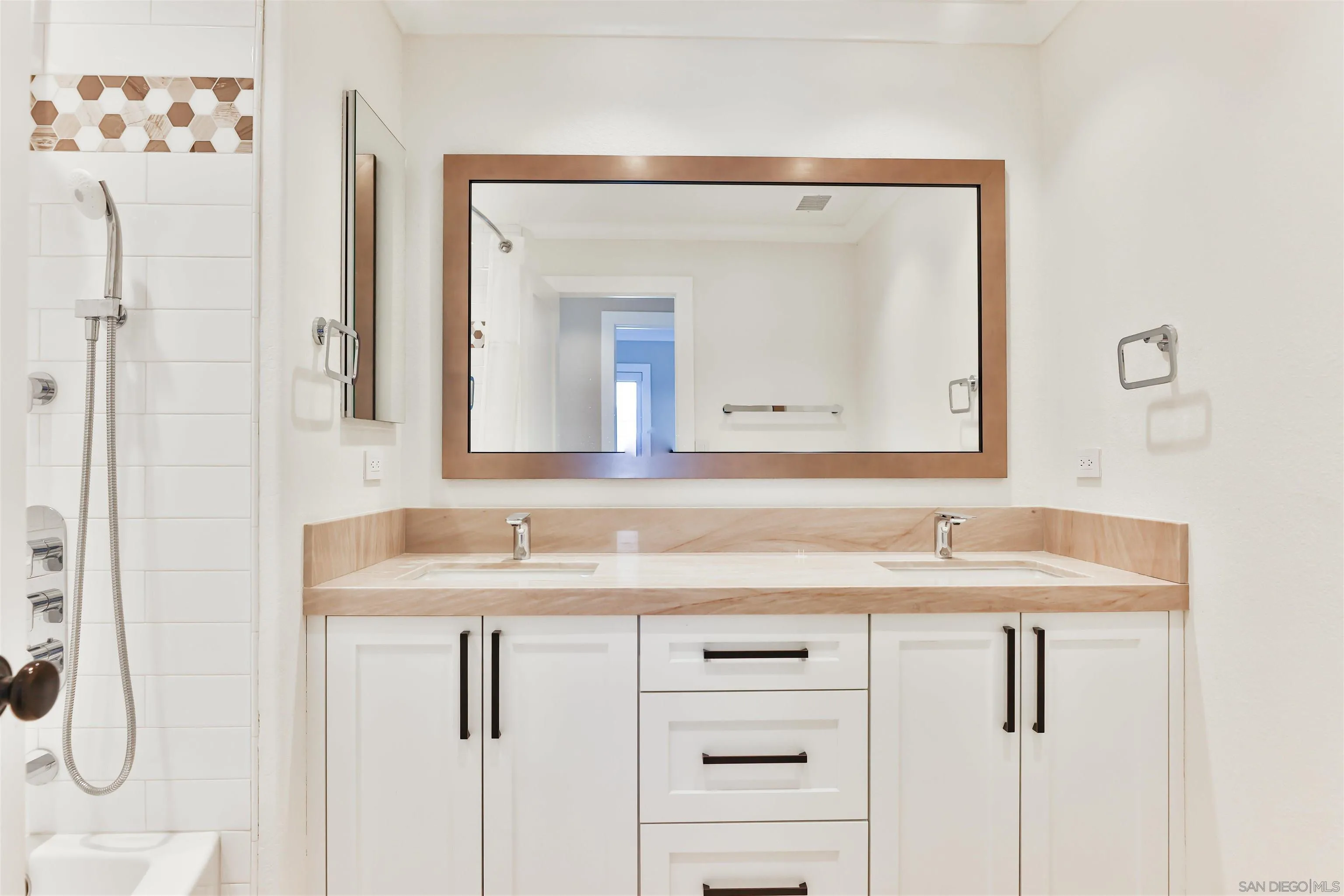 2102 Wandering Road Encinitas, CA 92024 - Photo 20 of 37 a bathroom with a granite countertop sink and a mirror