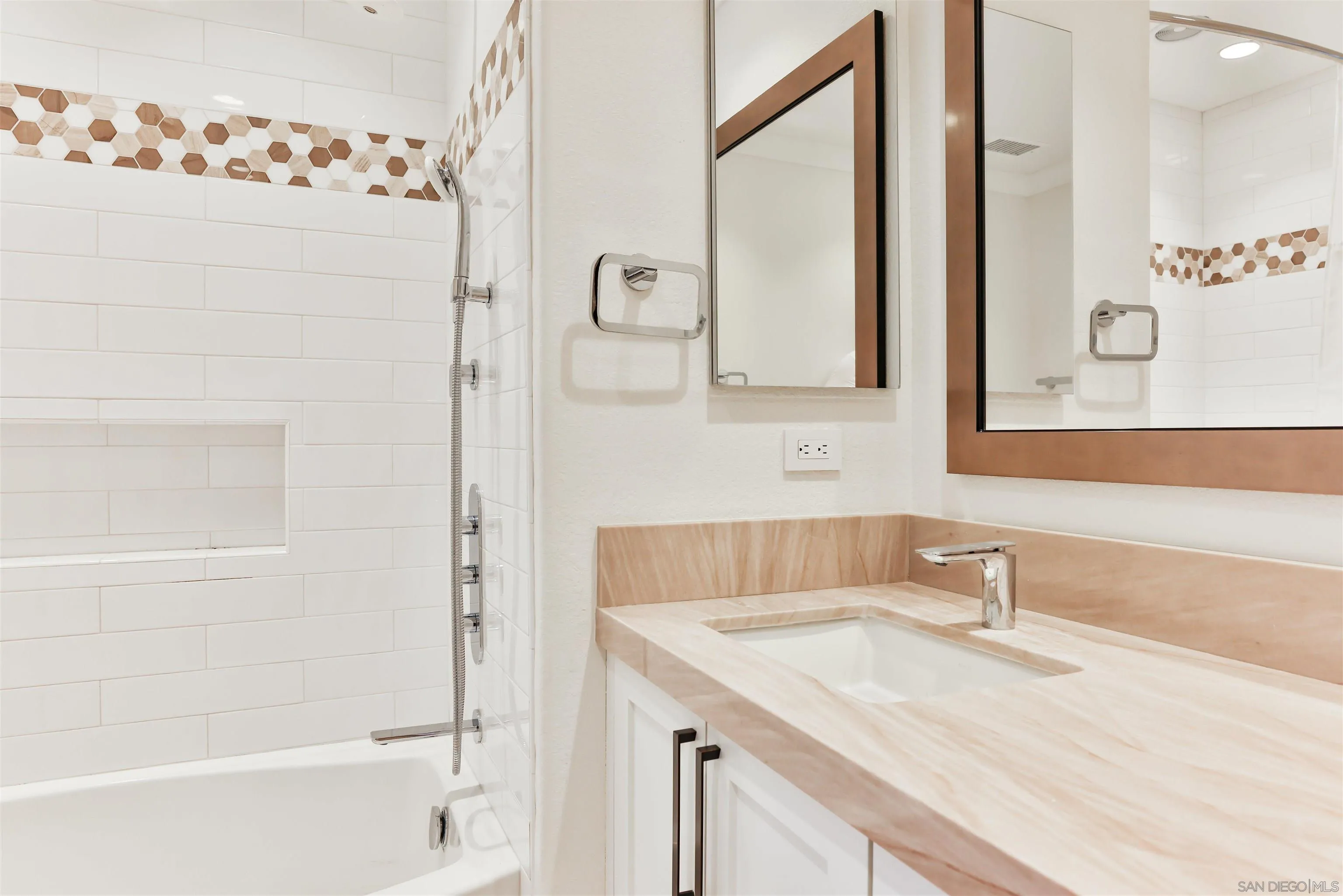 2102 Wandering Road Encinitas, CA 92024 - Photo 21 of 37 a bathroom with a granite countertop sink and a mirror