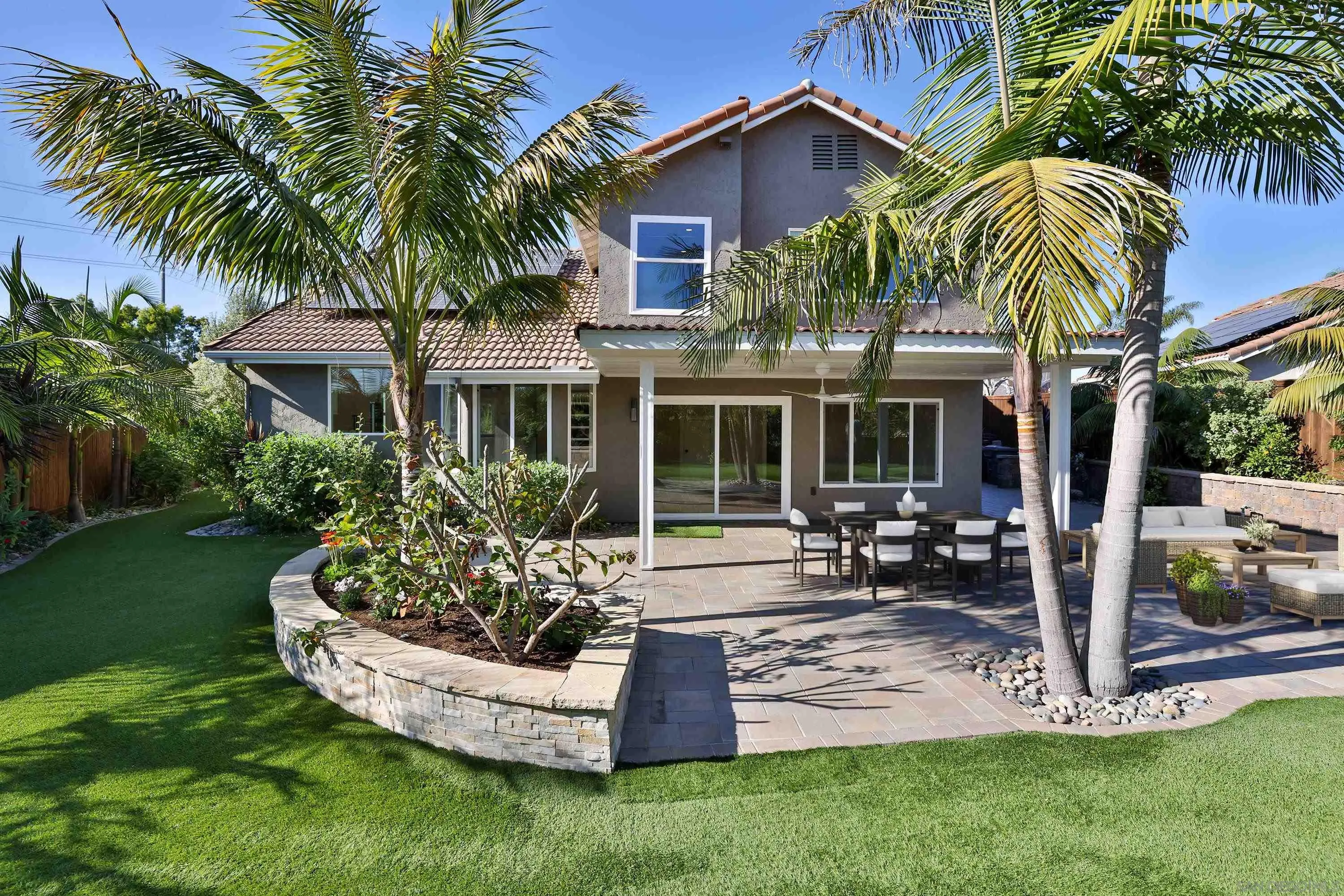 2102 Wandering Road Encinitas, CA 92024 - Photo 26 of 37 a view of a house with a yard patio and swimming pool