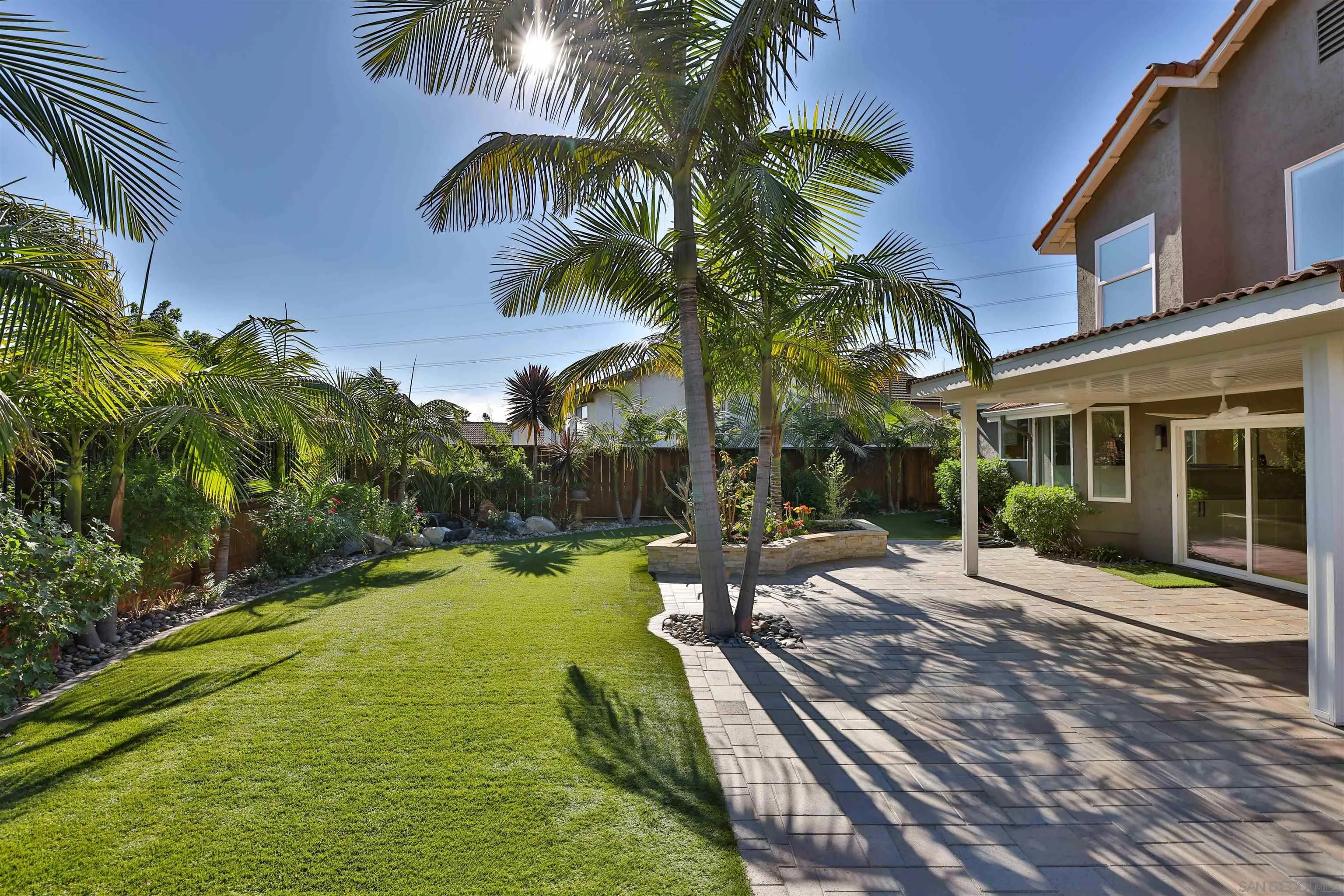 2102 Wandering Road Encinitas, CA 92024 - Photo 27 of 37 a view of a backyard with a patio