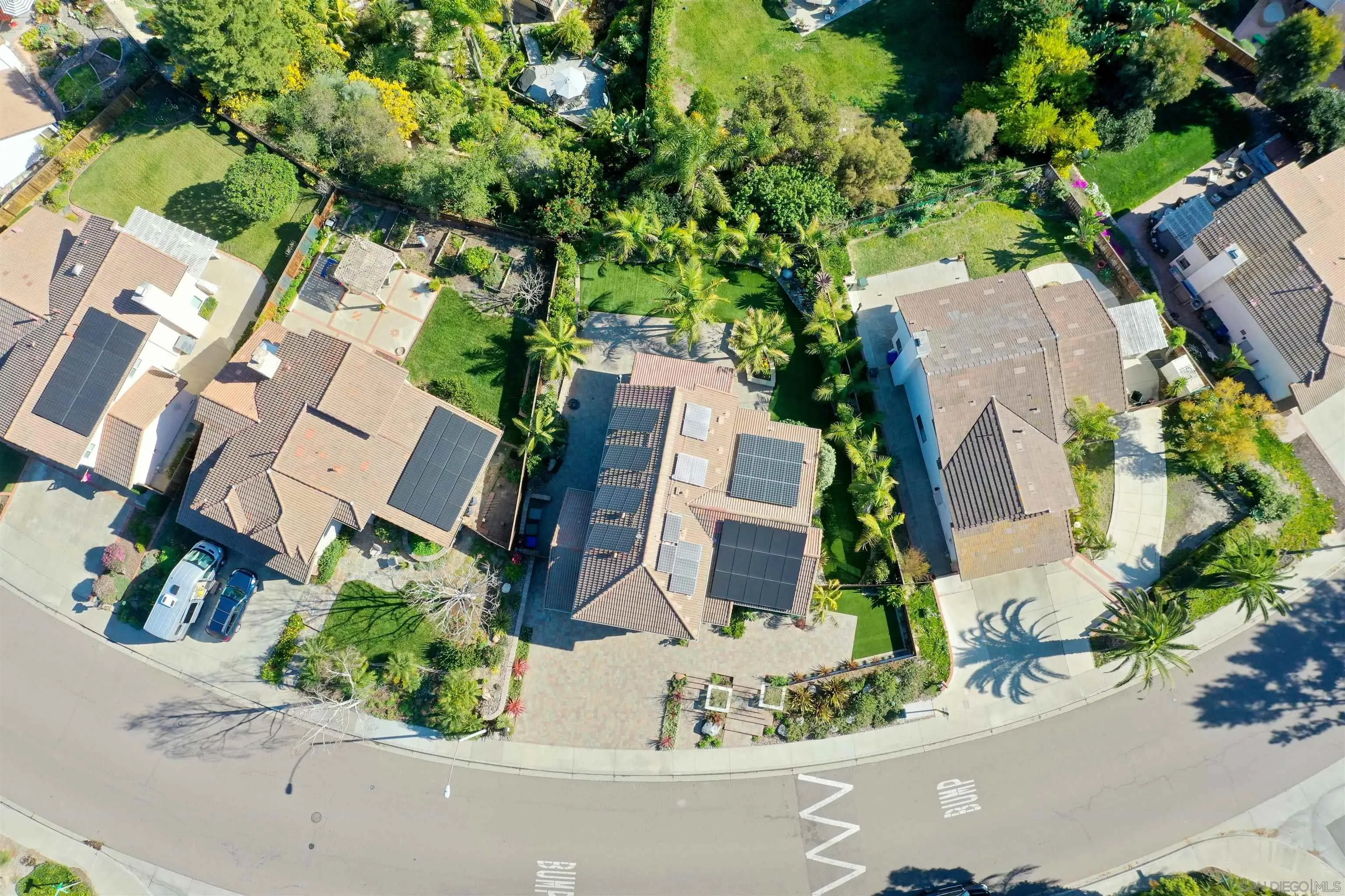 2102 Wandering Road Encinitas, CA 92024 - Photo 32 of 37 an aerial view of a house with a yard and garden