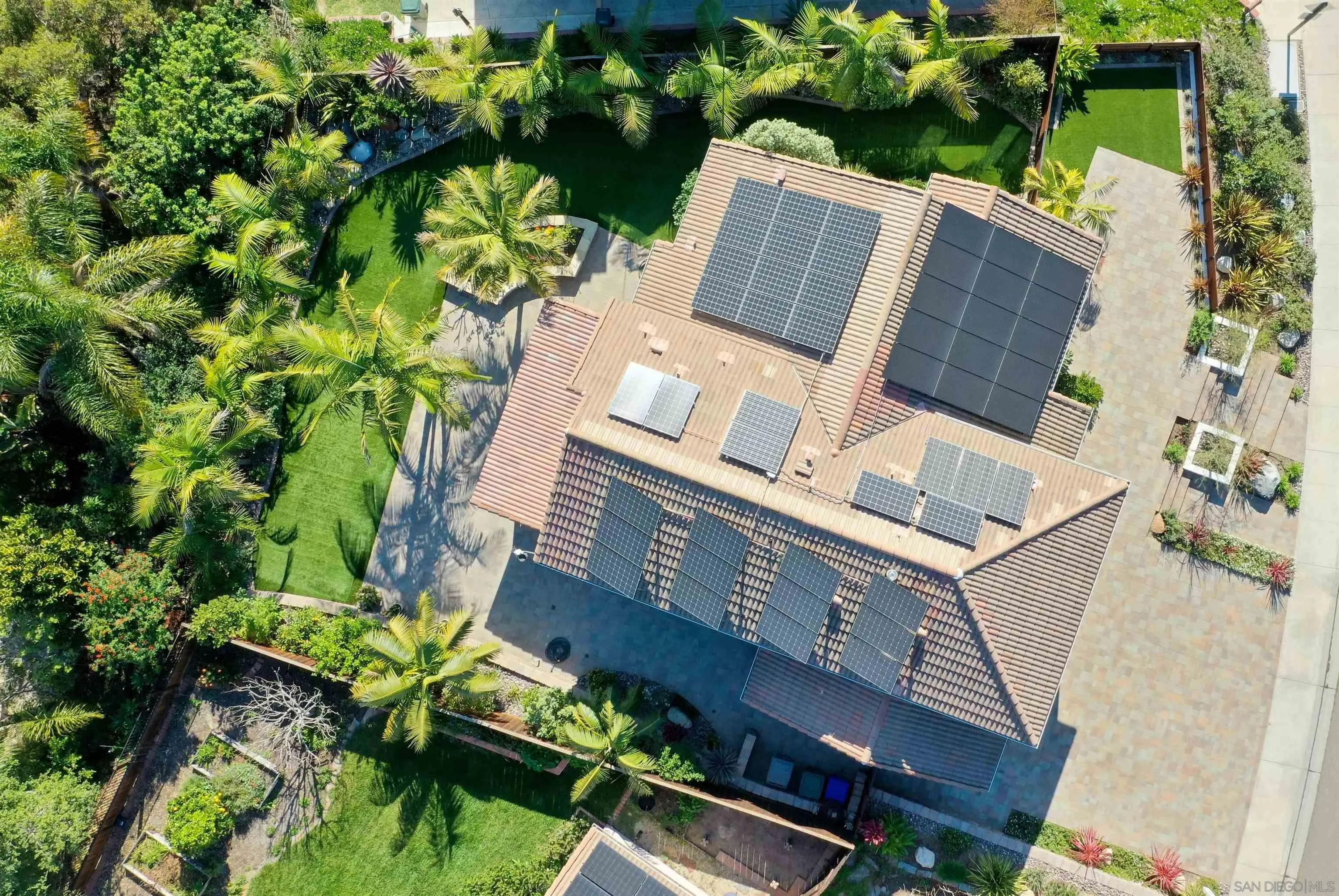 2102 Wandering Road Encinitas, CA 92024 - Photo 35 of 37 an aerial view of a house with a yard and sitting area