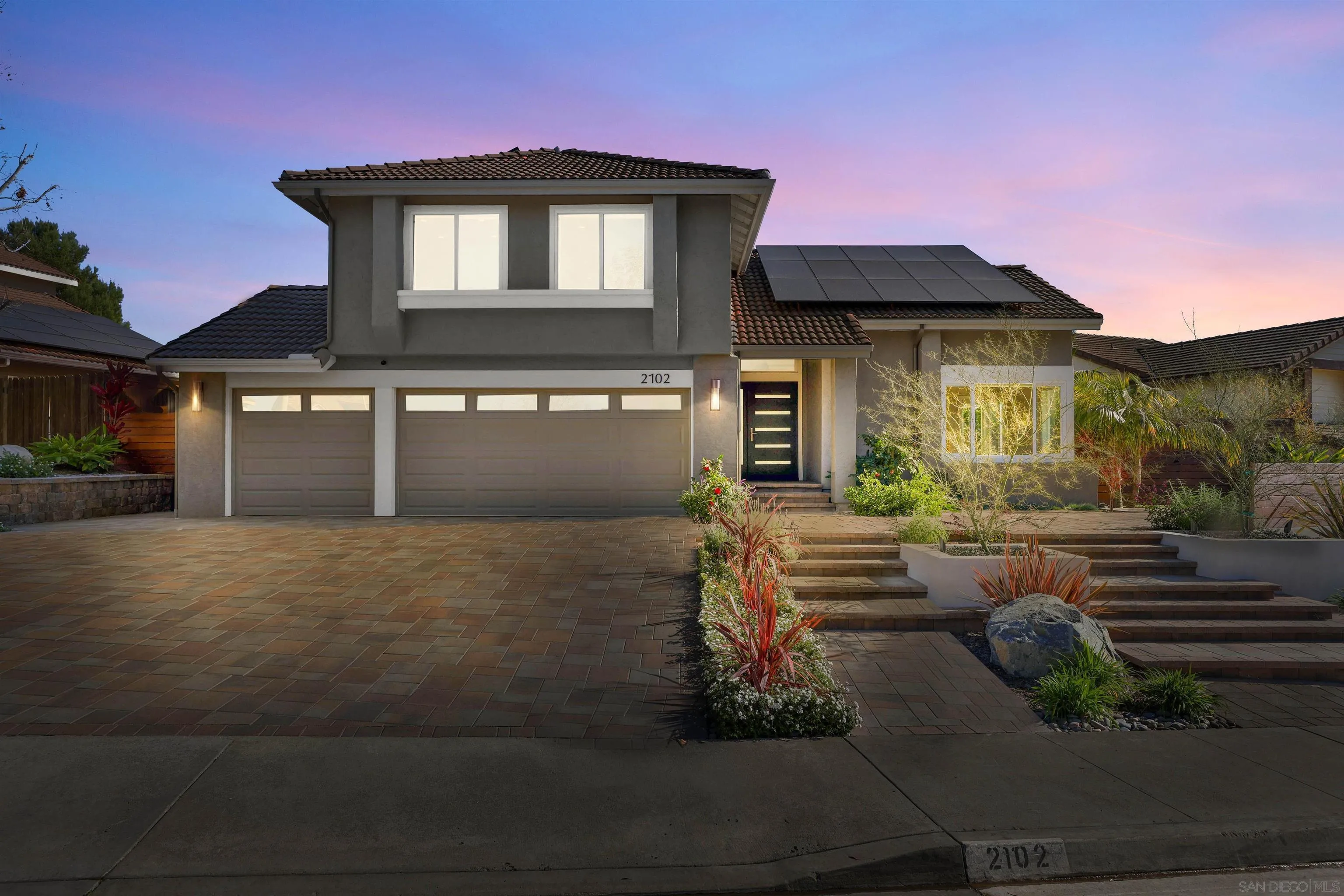 2102 Wandering Road Encinitas, CA 92024 - Photo 37 of 37 a front view of a house with garden