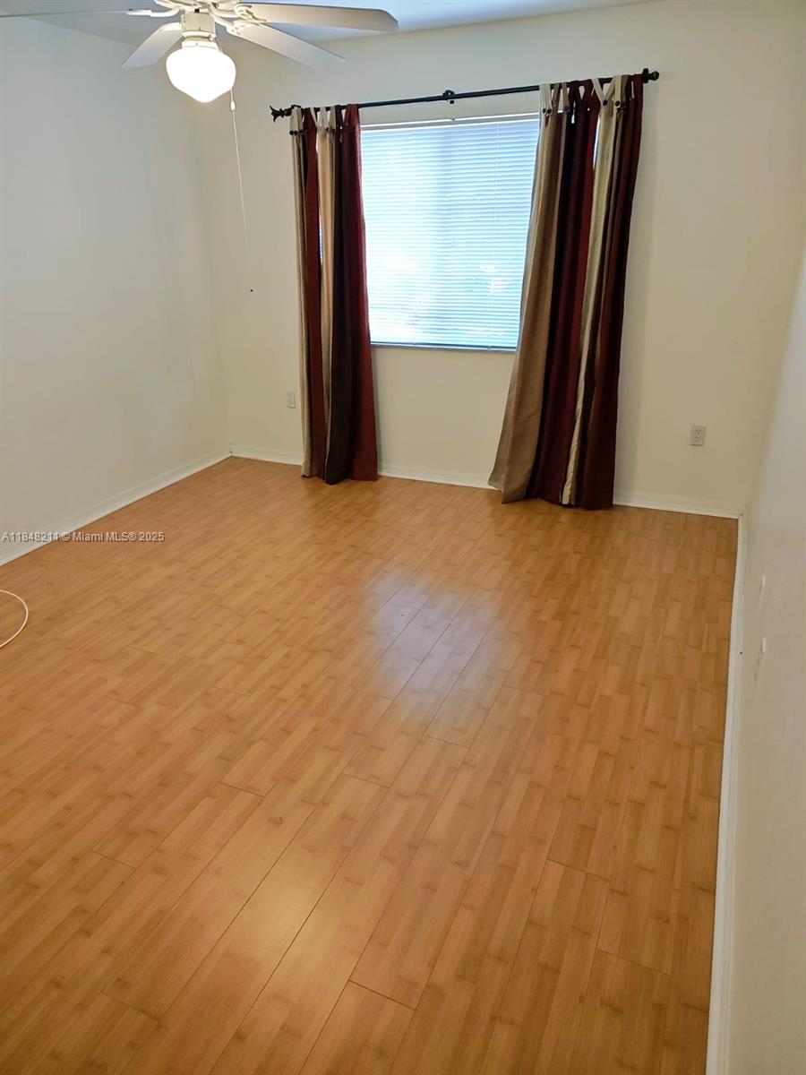 2586 Centergate Drive, Unit 307 Miramar, FL 33025 - Photo 27 of 43 a view of a room with a large window