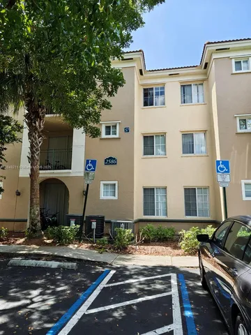 a front view of a house with yard