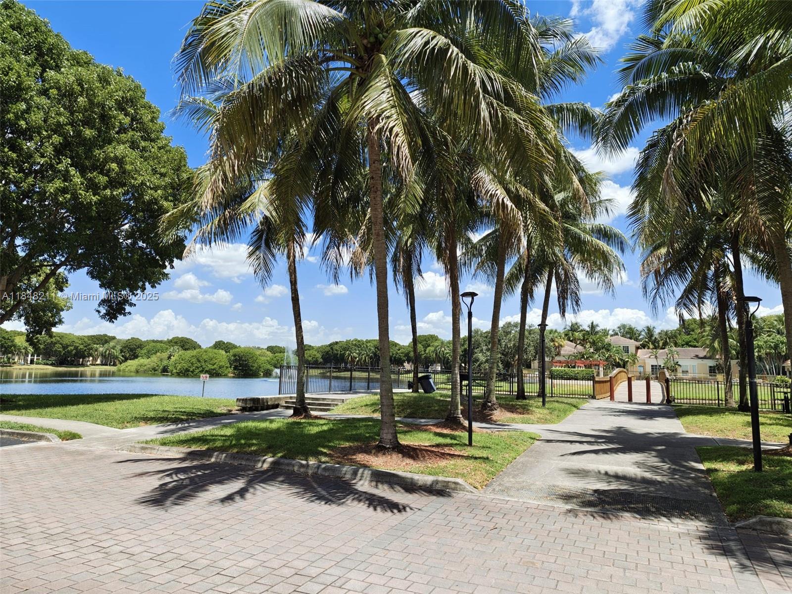 2586 Centergate Drive, Unit 307 Miramar, FL 33025 - Photo 42 of 43 a view of a park with palm trees