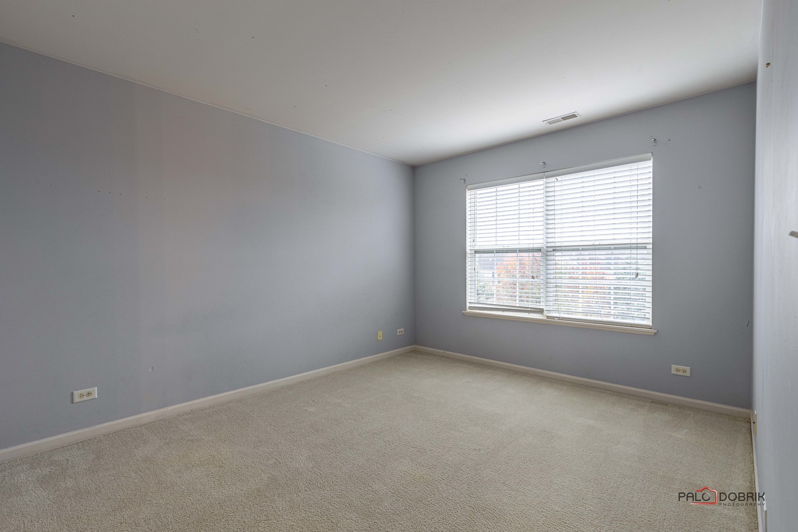 260 Comstock Drive, Unit 260 Elgin, IL 60124 - Photo 27 of 30 an empty room with a window