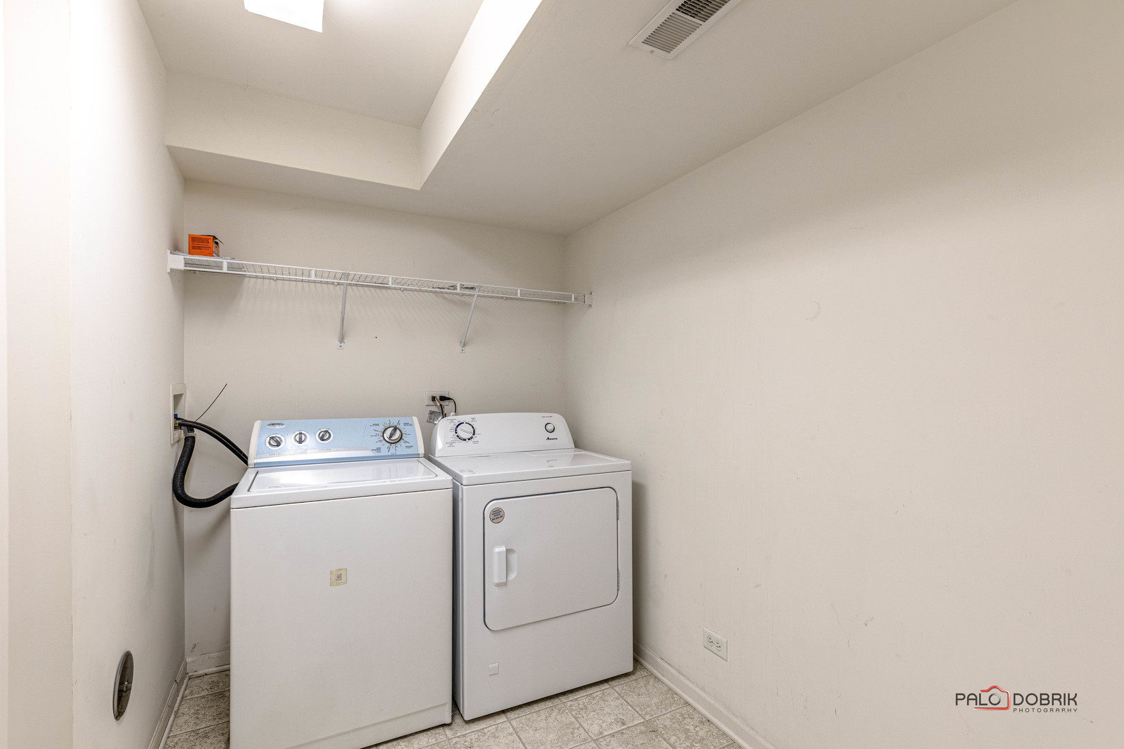 260 Comstock Drive, Unit 260 Elgin, IL 60124 - Photo 29 of 30 a utility room with dryer and washer