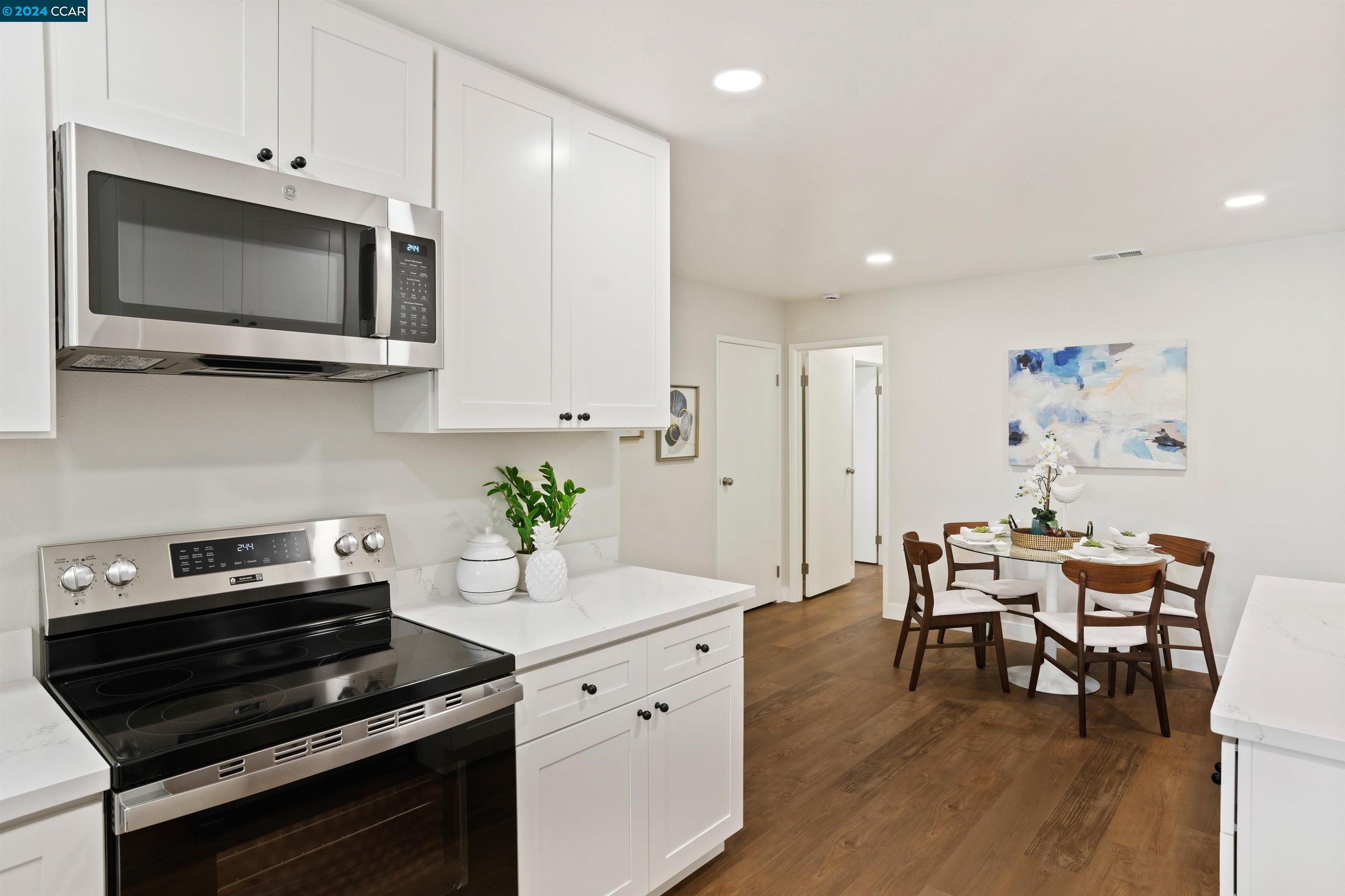 Pine Valley Road San Ramon, CA 94583 - Photo 15 of 34 a kitchen with a stove and a microwave