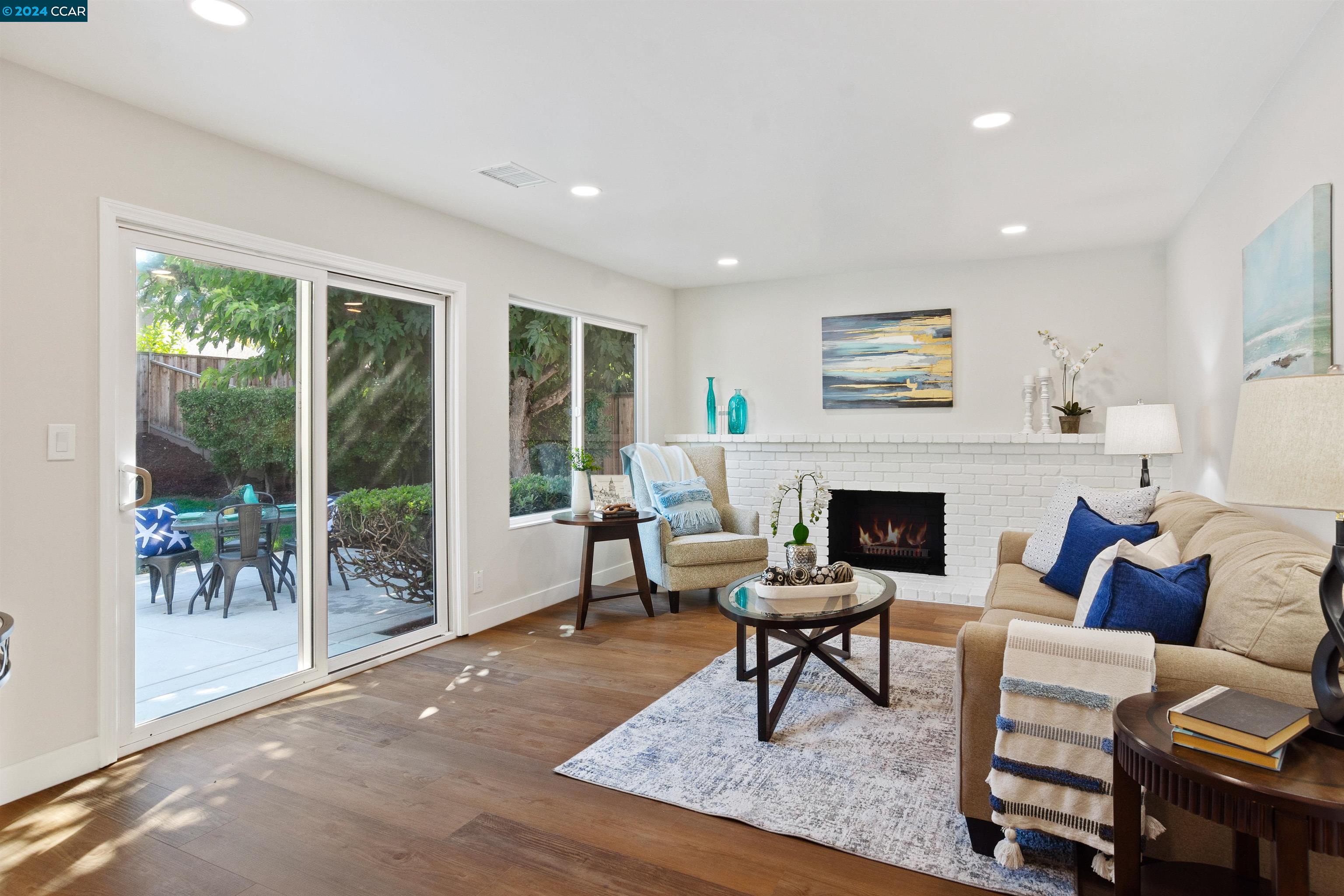 Pine Valley Road San Ramon, CA 94583 - Photo 16 of 34 a living room with furniture and a fireplace
