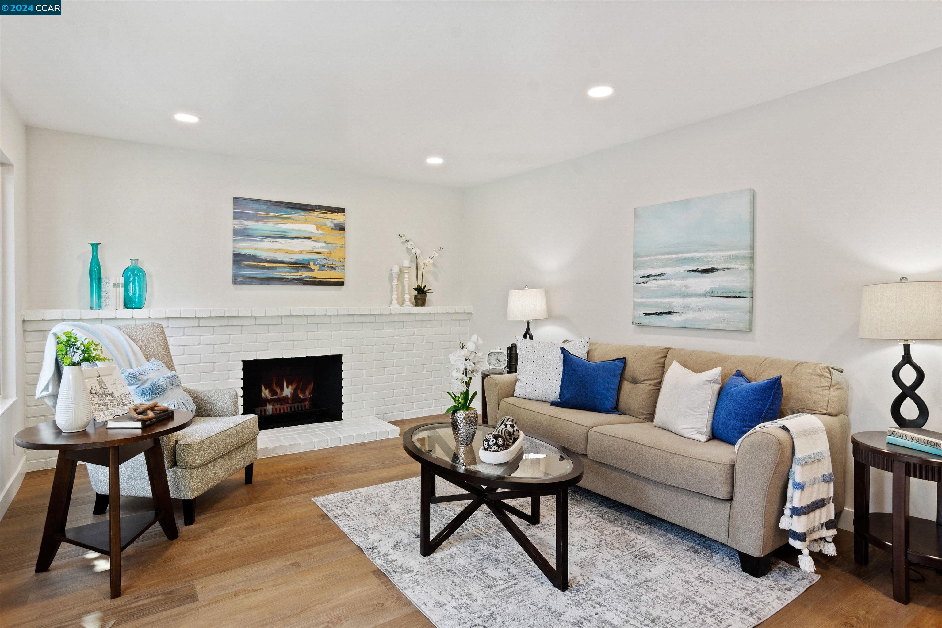 Pine Valley Road San Ramon, CA 94583 - Photo 17 of 34 a living room with furniture and a fireplace