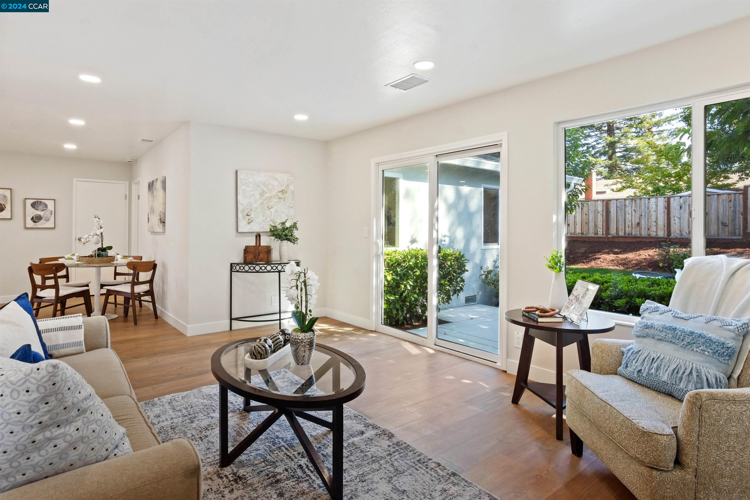 Pine Valley Road San Ramon, CA 94583 - Photo 18 of 34 a living room with furniture and a table