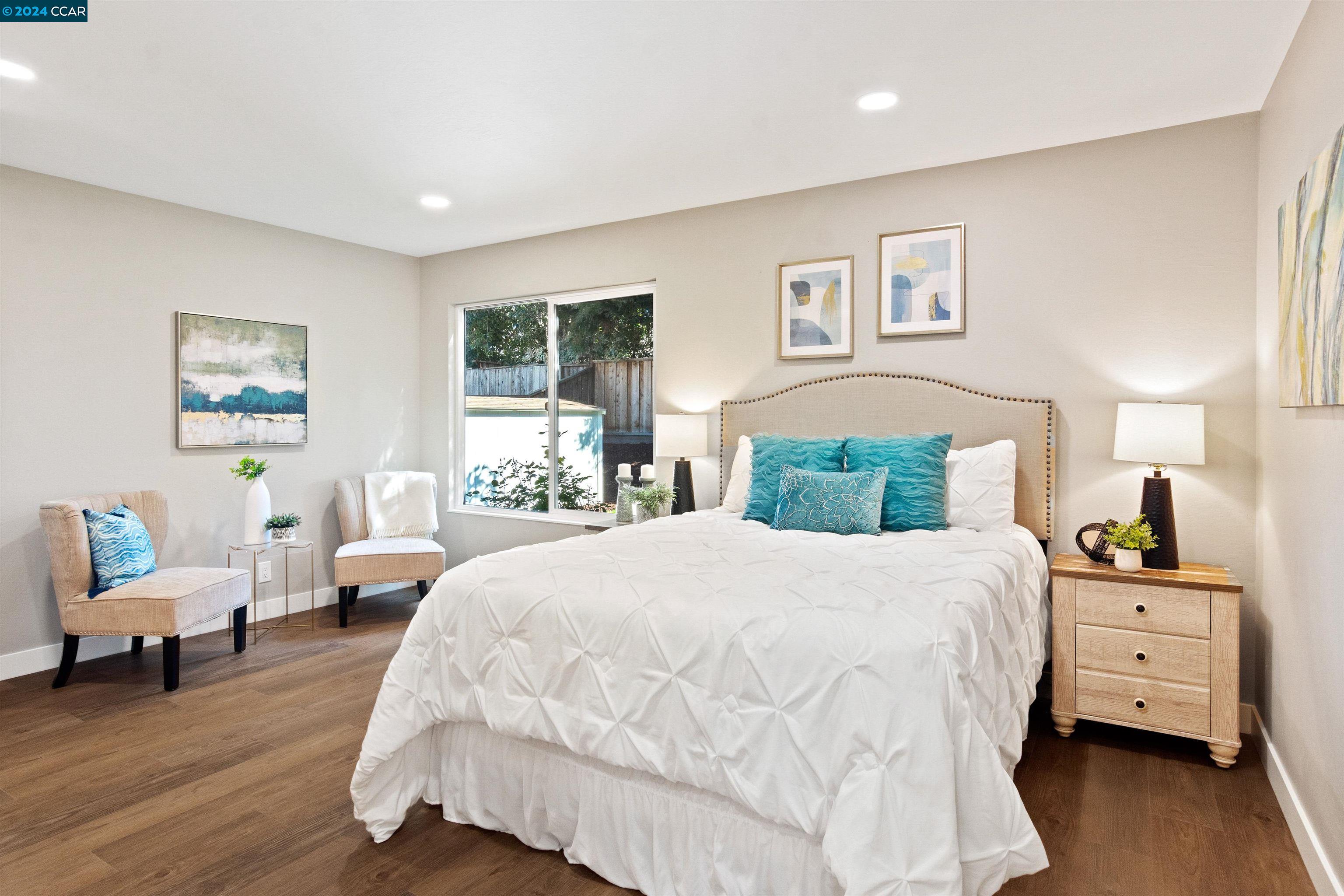 Pine Valley Road San Ramon, CA 94583 - Photo 19 of 34 a bedroom with a bed and wooden floor