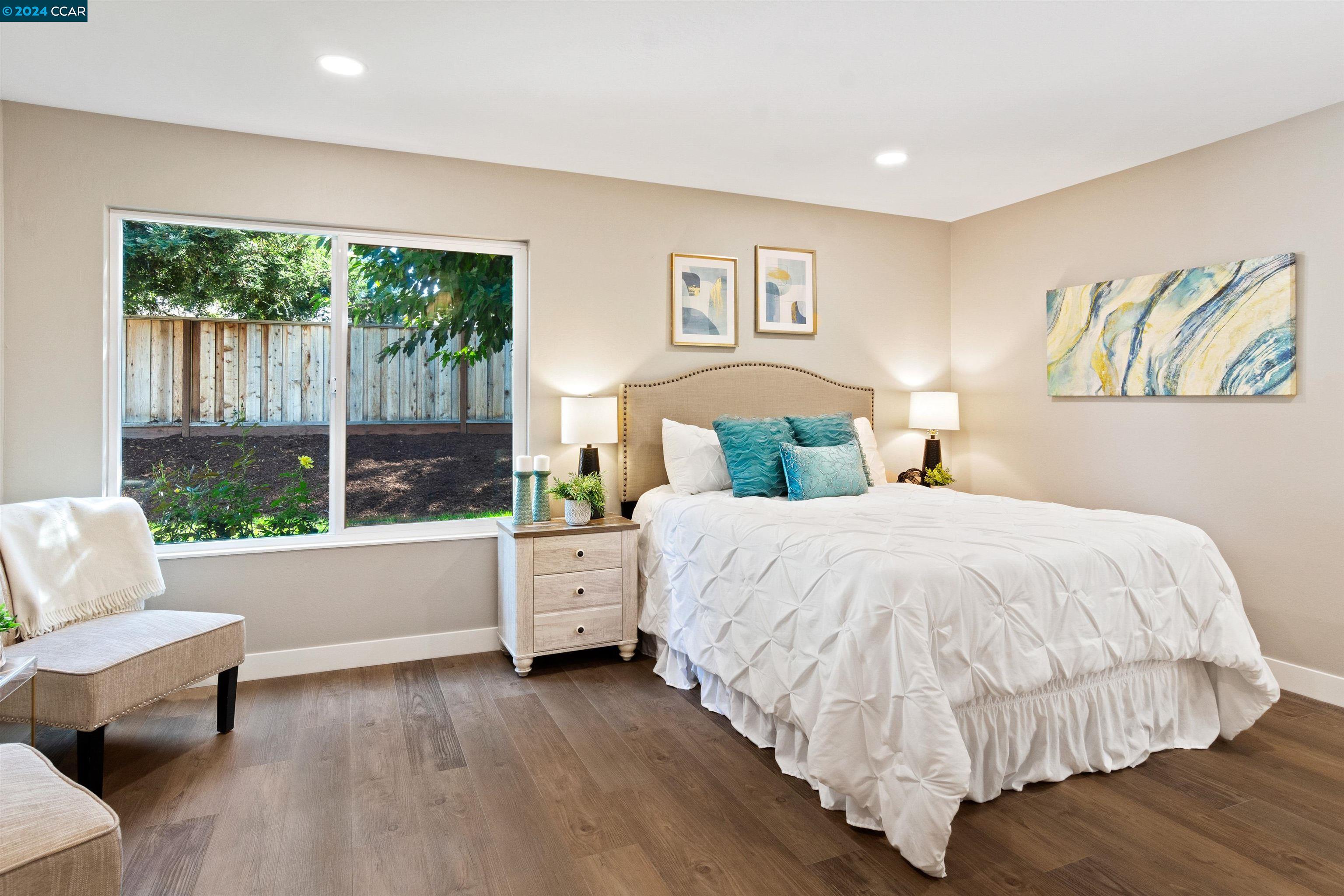 Pine Valley Road San Ramon, CA 94583 - Photo 20 of 34 a bedroom with a bed and a large window