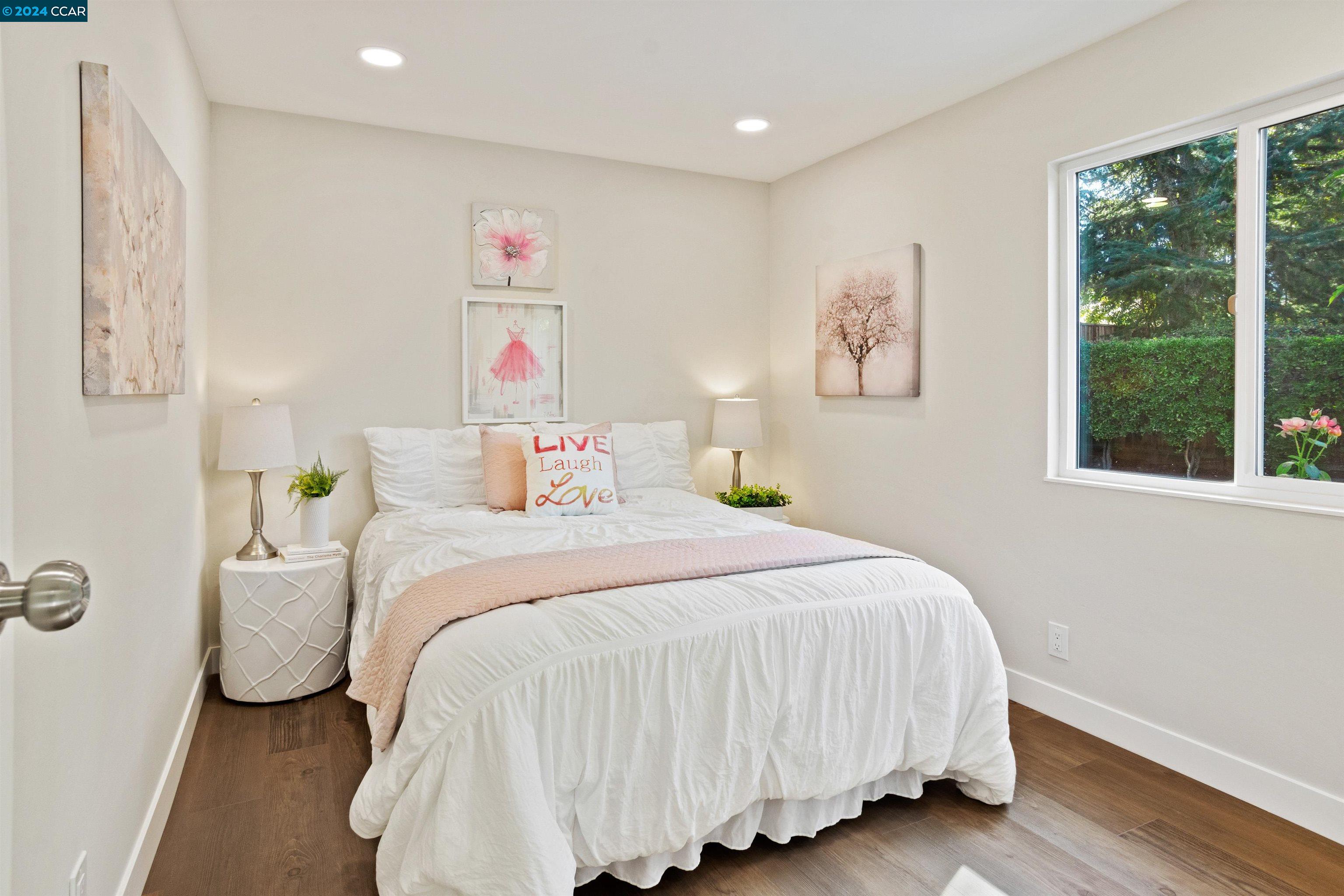 Pine Valley Road San Ramon, CA 94583 - Photo 24 of 34 a bedroom with a bed and a large window