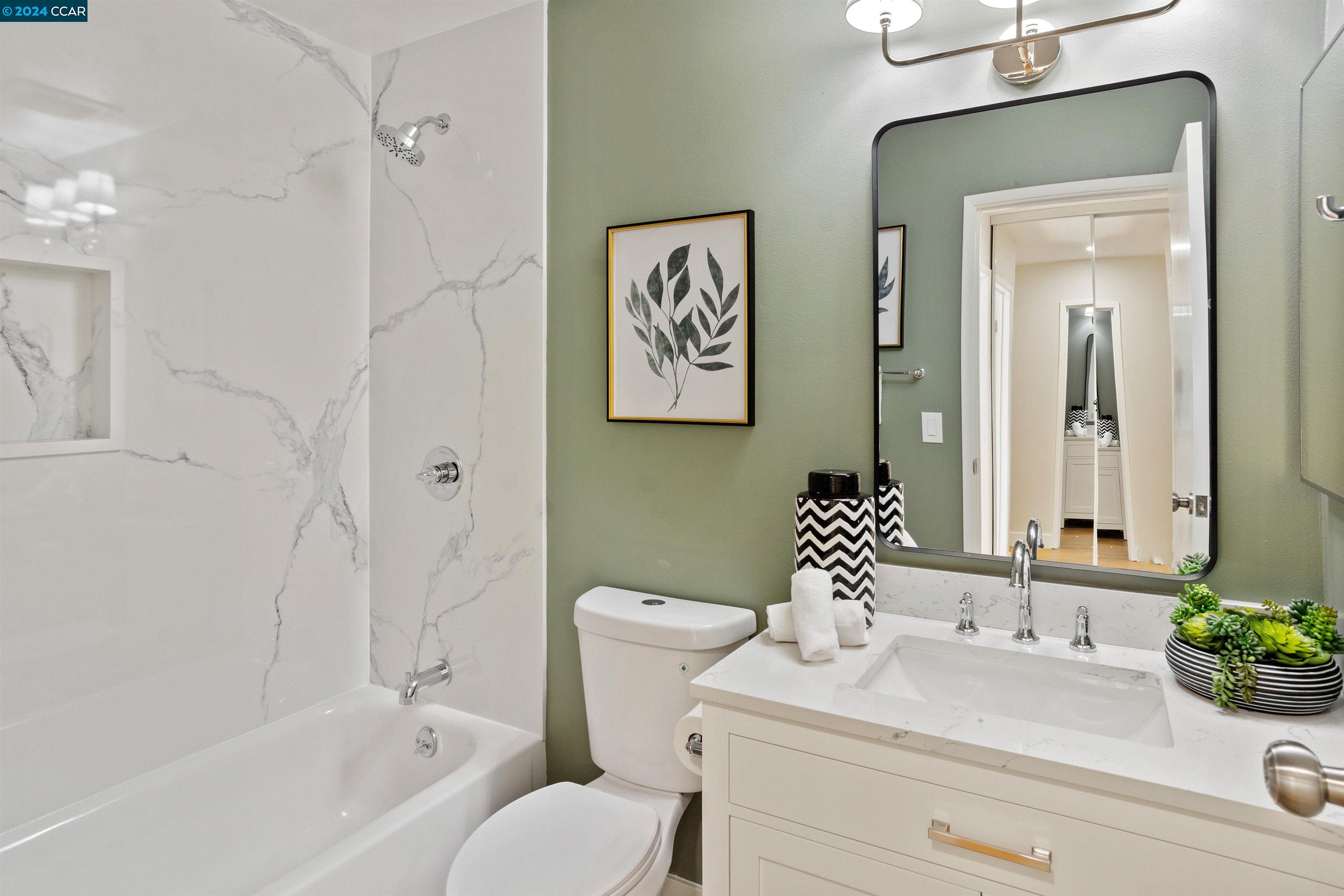 Pine Valley Road San Ramon, CA 94583 - Photo 26 of 34 a bathroom with a sink a toilet and a bathtub