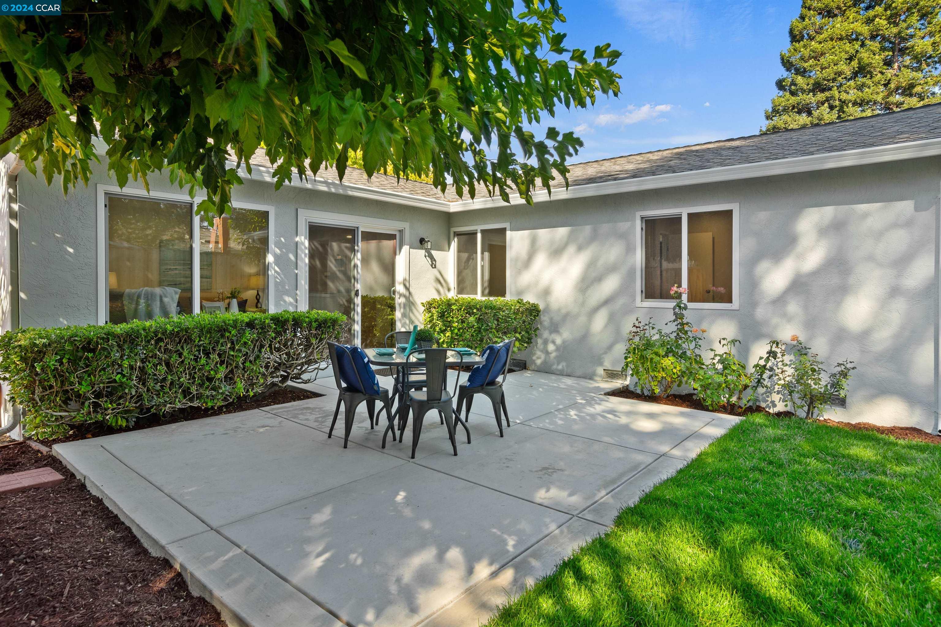 Pine Valley Road San Ramon, CA 94583 - Photo 29 of 34 a view of a house with backyard and a sitting area