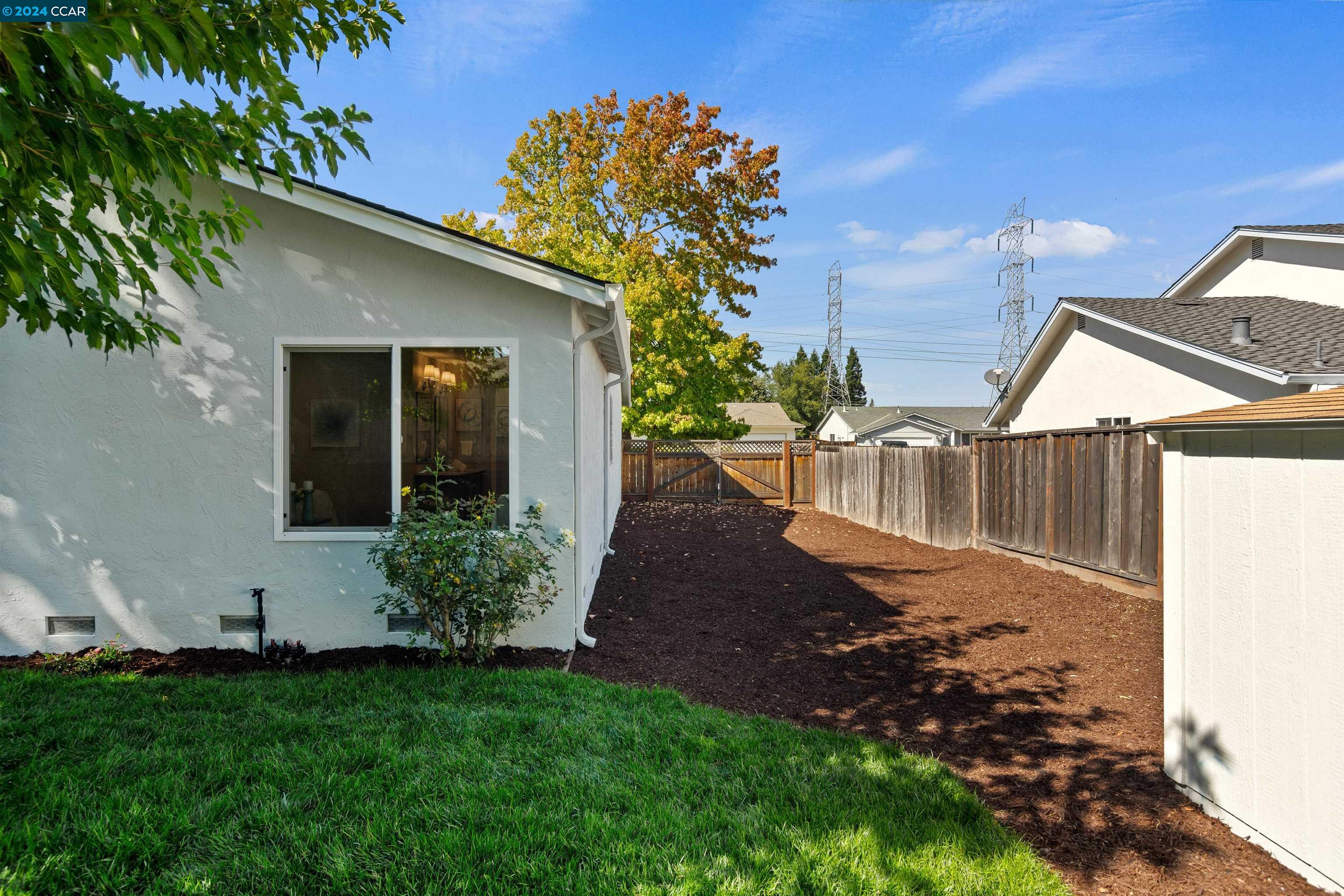 Pine Valley Road San Ramon, CA 94583 - Photo 33 of 34 a view of backyard with a garden and plants